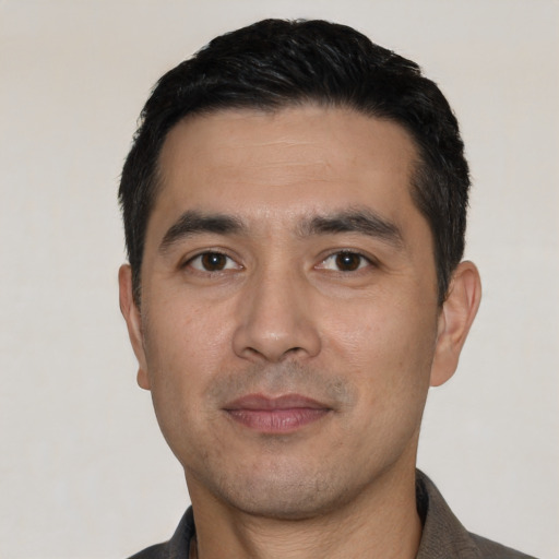 Neutral white young-adult male with short  black hair and brown eyes