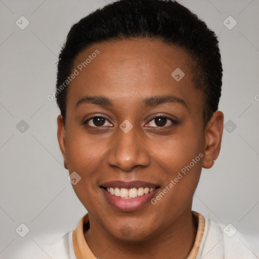 Joyful black young-adult female with short  brown hair and brown eyes