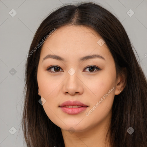 Joyful asian young-adult female with long  brown hair and brown eyes