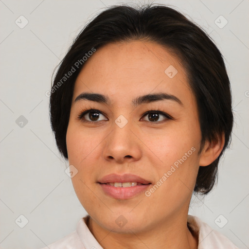 Joyful asian young-adult female with medium  brown hair and brown eyes