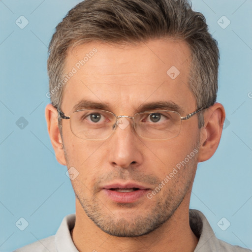 Neutral white adult male with short  brown hair and brown eyes