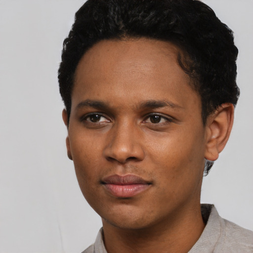 Neutral black young-adult male with short  black hair and brown eyes