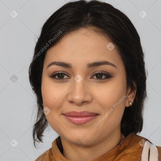 Joyful latino young-adult female with medium  brown hair and brown eyes