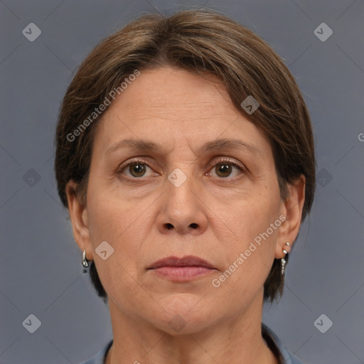 Joyful white adult female with short  brown hair and brown eyes