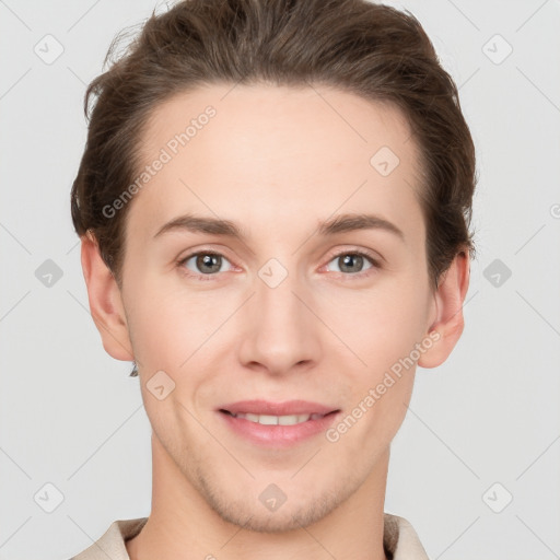 Joyful white young-adult female with short  brown hair and grey eyes