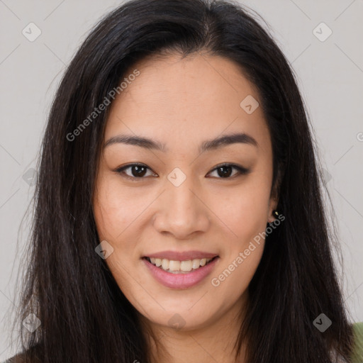 Joyful asian young-adult female with long  brown hair and brown eyes