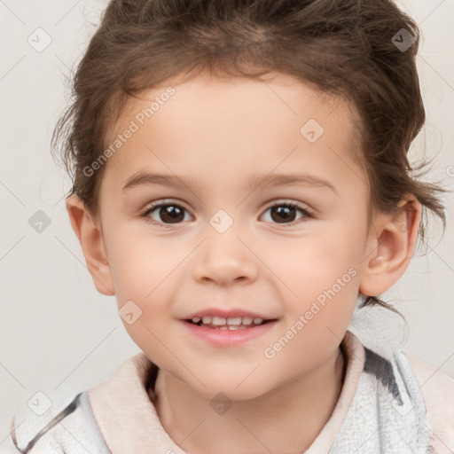 Joyful white child female with short  brown hair and brown eyes