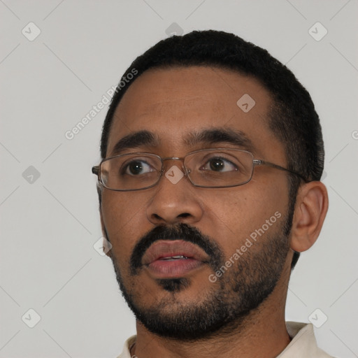 Neutral black young-adult male with short  black hair and brown eyes