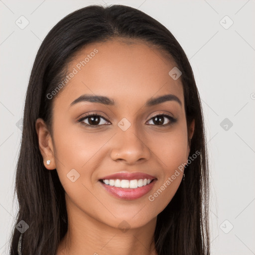 Joyful latino young-adult female with long  brown hair and brown eyes