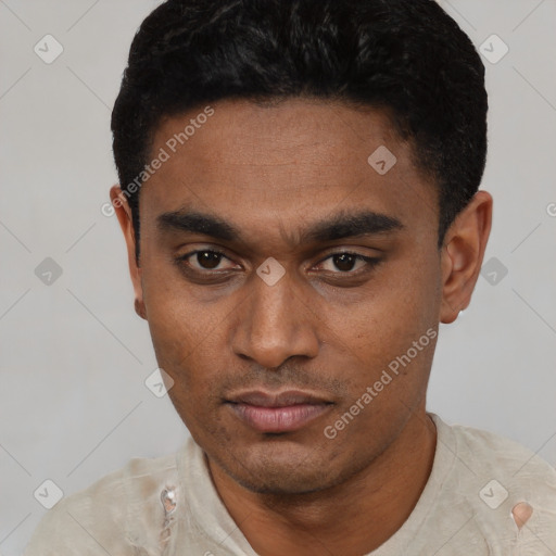 Neutral latino young-adult male with short  black hair and brown eyes