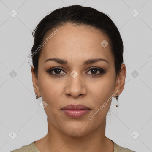 Joyful latino young-adult female with short  brown hair and brown eyes