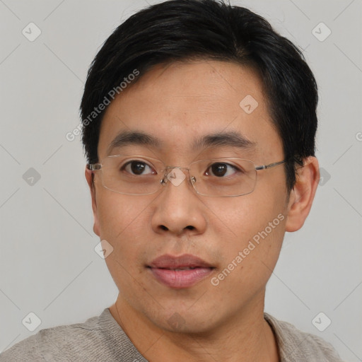 Neutral asian young-adult male with short  black hair and brown eyes