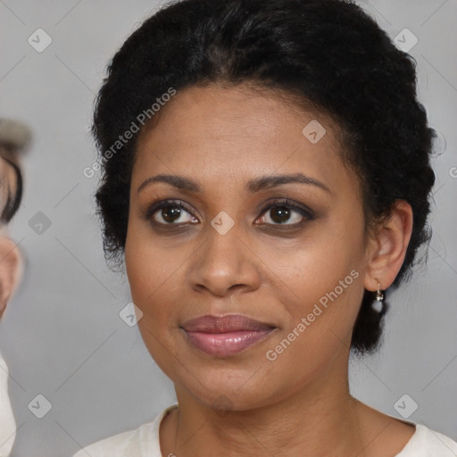 Joyful latino young-adult female with medium  black hair and brown eyes