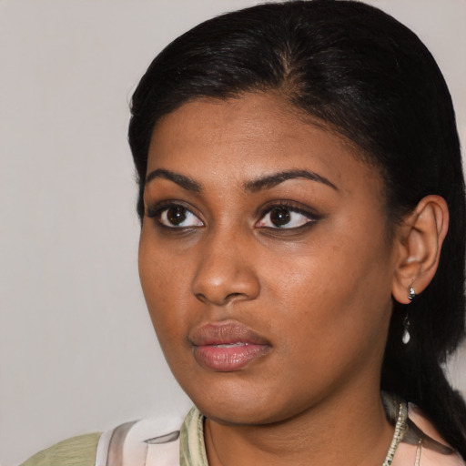 Neutral black young-adult female with medium  black hair and brown eyes