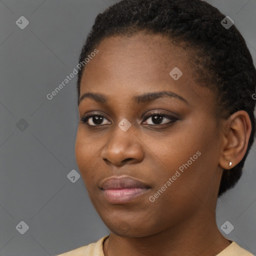 Neutral black young-adult female with short  black hair and brown eyes