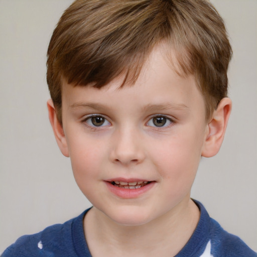 Joyful white child male with short  brown hair and brown eyes