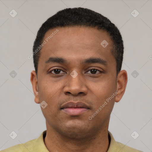 Neutral latino young-adult male with short  black hair and brown eyes