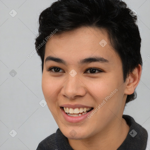 Joyful asian young-adult female with short  brown hair and brown eyes