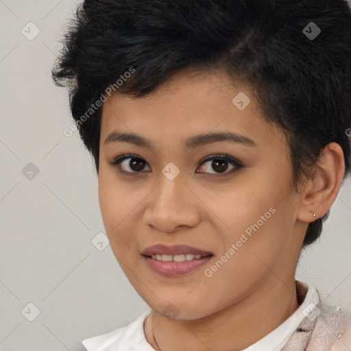 Joyful latino young-adult female with short  brown hair and brown eyes