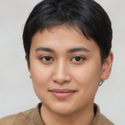 Joyful asian young-adult female with short  brown hair and brown eyes