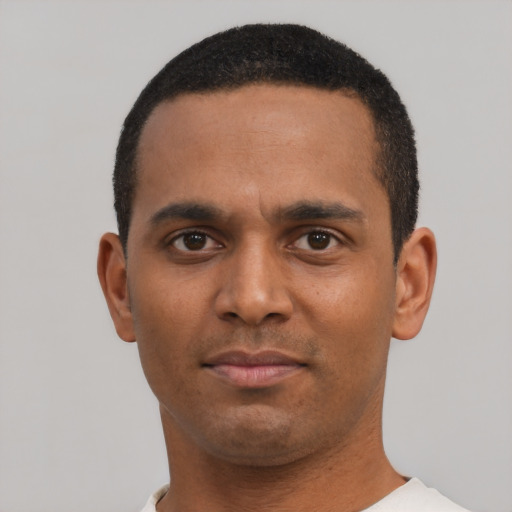 Neutral black young-adult male with short  black hair and brown eyes