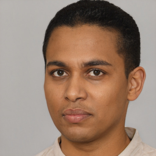 Neutral latino young-adult male with short  black hair and brown eyes