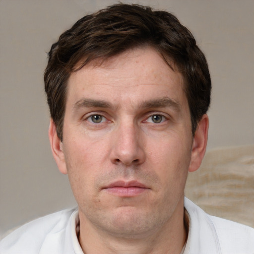 Neutral white adult male with short  brown hair and brown eyes