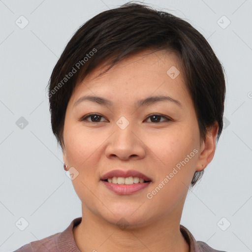 Joyful asian young-adult female with short  brown hair and brown eyes