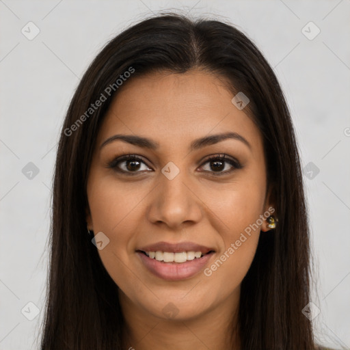 Joyful latino young-adult female with long  brown hair and brown eyes