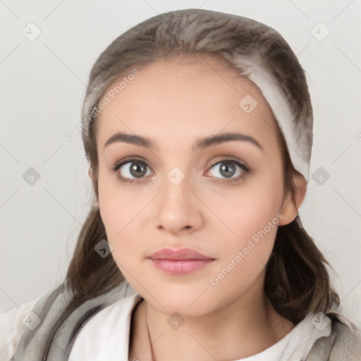 Neutral white young-adult female with medium  brown hair and brown eyes