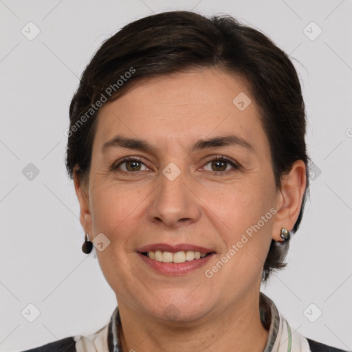 Joyful white adult female with medium  brown hair and grey eyes