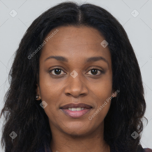 Joyful black young-adult female with long  brown hair and brown eyes