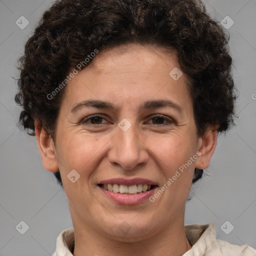 Joyful white adult female with short  brown hair and brown eyes