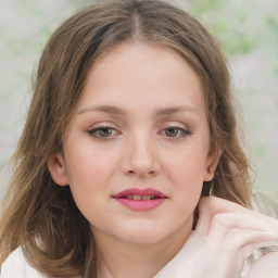 Joyful white child female with medium  brown hair and brown eyes