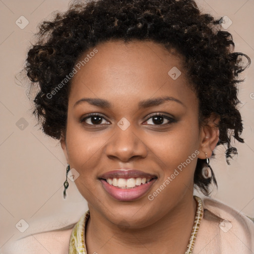 Joyful black young-adult female with long  brown hair and brown eyes