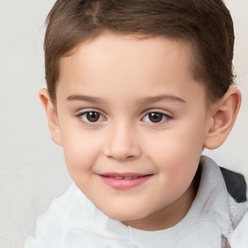 Joyful white child female with short  brown hair and brown eyes