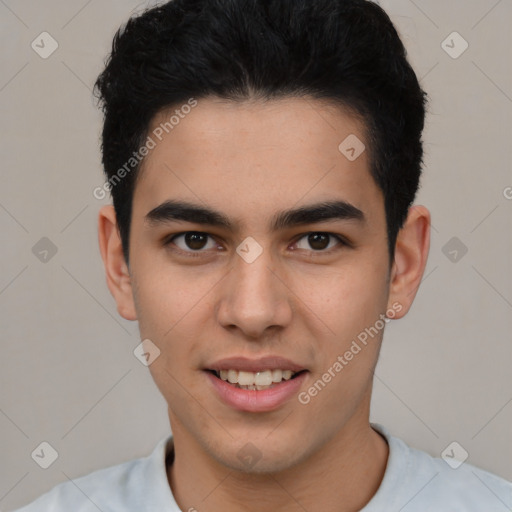 Joyful latino young-adult male with short  brown hair and brown eyes