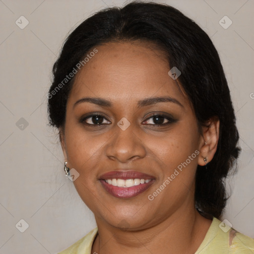 Joyful black young-adult female with medium  brown hair and brown eyes