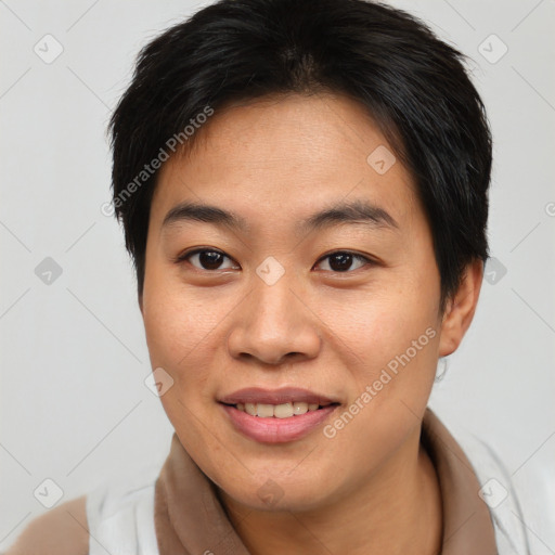 Joyful asian young-adult female with short  brown hair and brown eyes