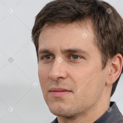 Neutral white adult male with short  brown hair and brown eyes