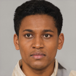 Neutral black young-adult male with short  brown hair and brown eyes