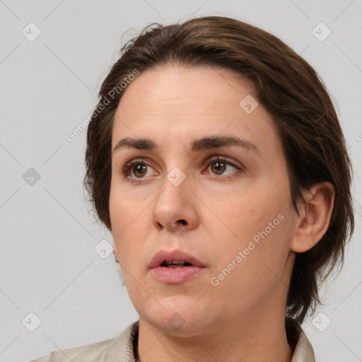 Neutral white young-adult female with medium  brown hair and brown eyes