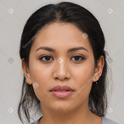 Joyful latino young-adult female with medium  brown hair and brown eyes