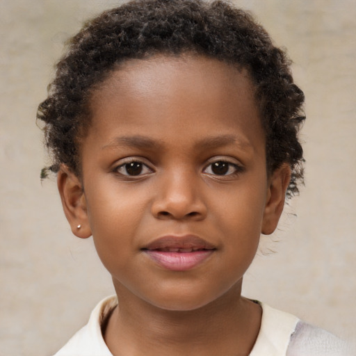 Joyful black child female with short  brown hair and brown eyes