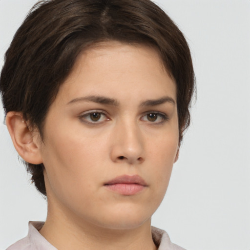 Neutral white young-adult female with short  brown hair and brown eyes