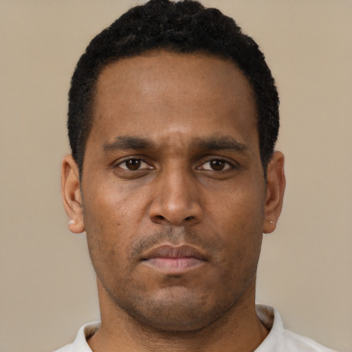 Neutral black young-adult male with short  brown hair and brown eyes