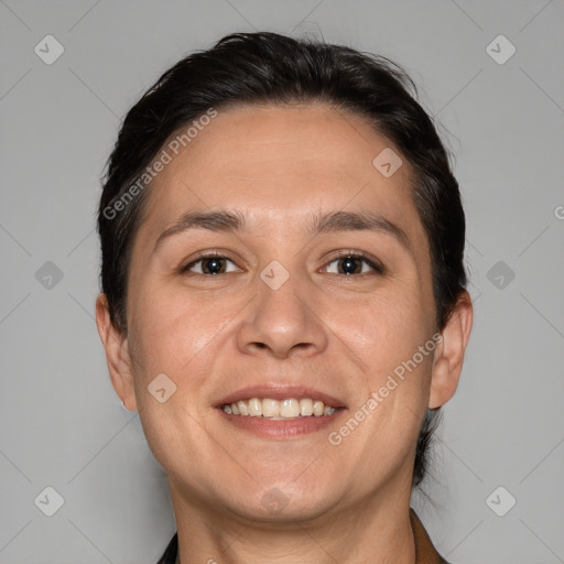 Joyful white adult female with short  brown hair and brown eyes