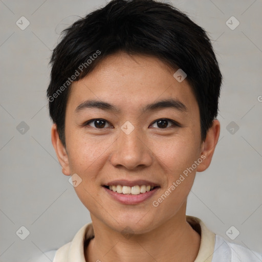 Joyful asian young-adult male with short  brown hair and brown eyes