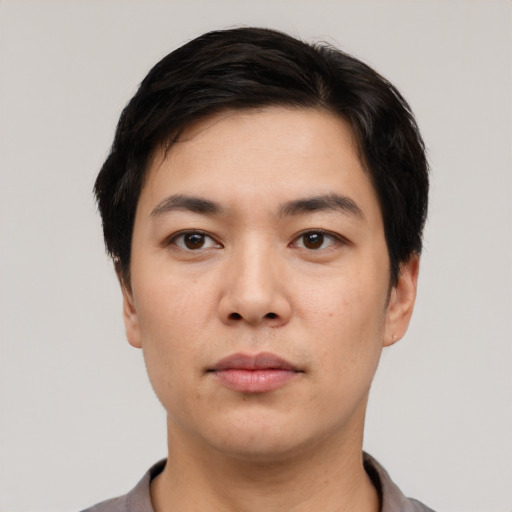 Neutral asian young-adult male with short  black hair and brown eyes