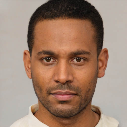 Neutral latino young-adult male with short  brown hair and brown eyes